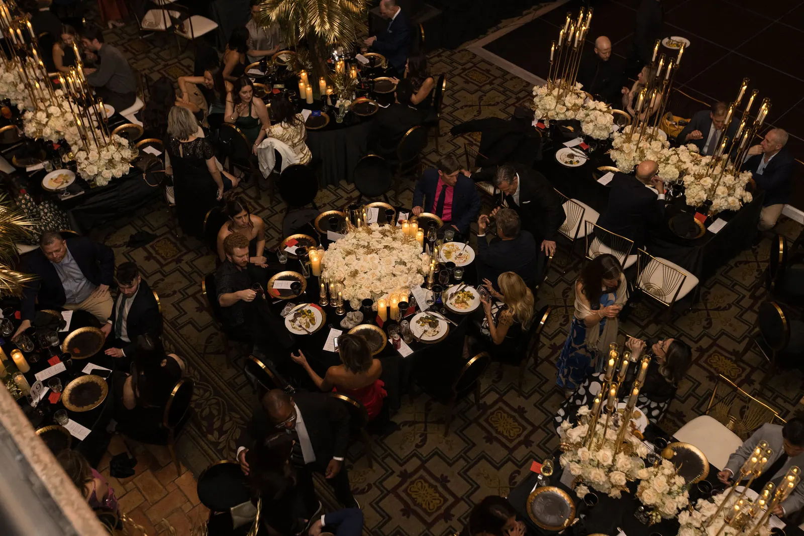 Aerial view of an elegant ballroom set for a gala dinner at the Edge 2025 event, photographed by Marquee Visuals.