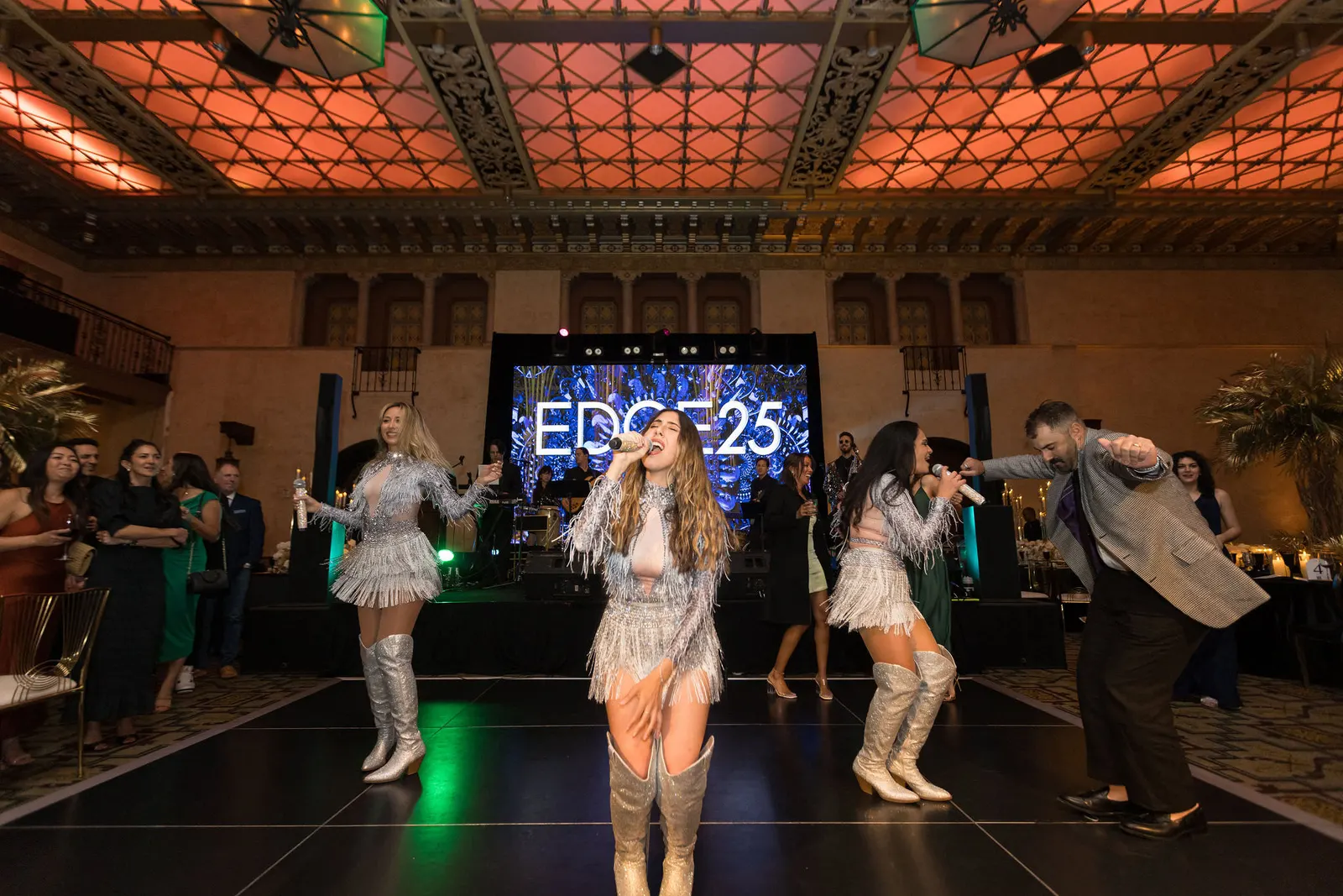 Dancers performing on stage in an ornate ballroom at the Edge 2025 gala, photographed by Marquee Visuals in Los Angeles.