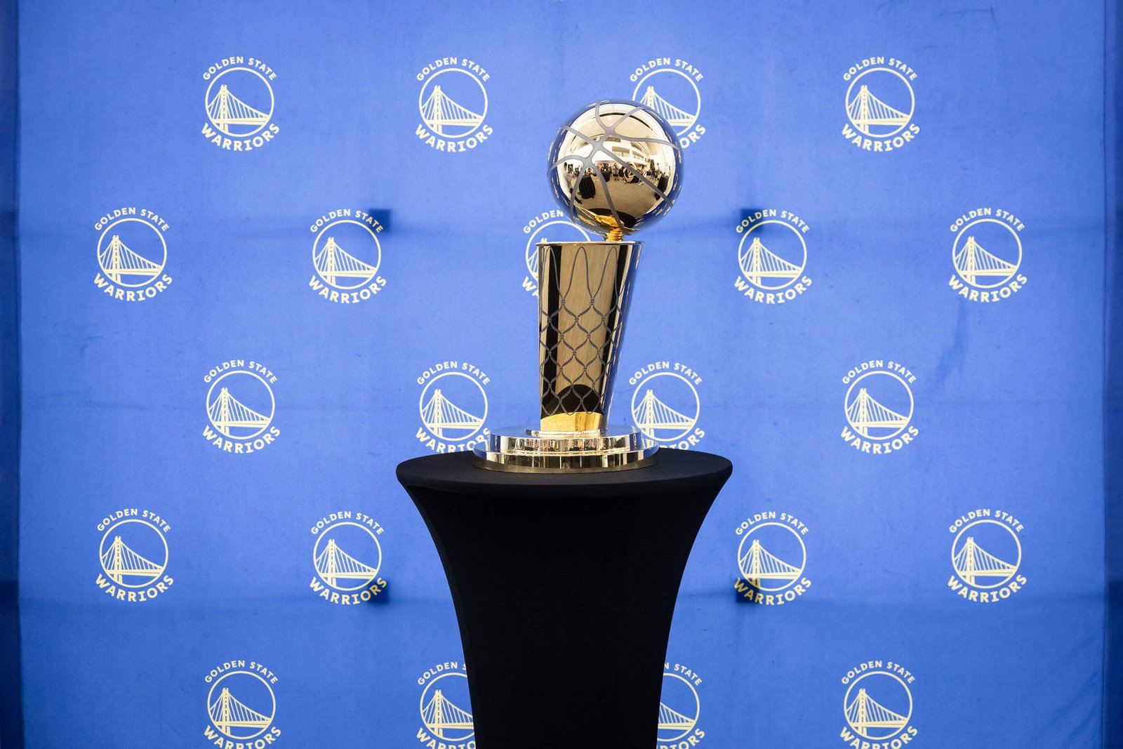 Golden State Warriors championship trophy displayed on a step-and-repeat backdrop, photographed by Marquee Visuals in the Bay Area.